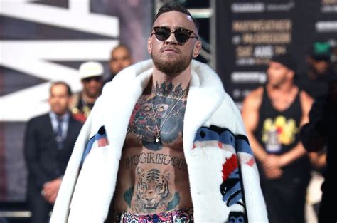 Conor McGregor’s Flamboyant Gucci Mink Coat & Ensemble